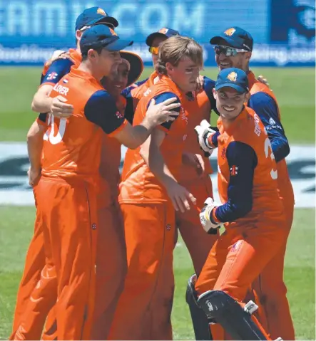  ?? Picture: AFP ?? Netherland­s players celebrate their shock win over South Africa at Adelaide Oval.