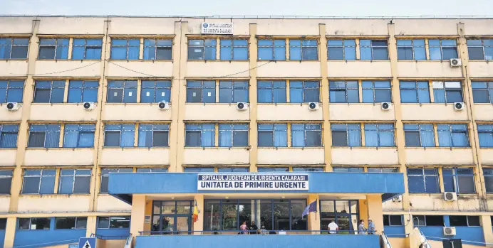  ?? ?? People wait outside a hospital, Calarasi, southern Romania, July, 27, 2020.