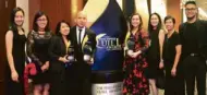  ??  ?? LANDBANK First Vice President for Corporate Affairs Catherine Rowena B. Villanueva and First Vice President for Strategic Planning Elcid S. Pangilinan receive the Bank’s awards during the 16th Philippine Quill Awards. They are joined by Assistant Vice...