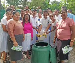  ?? Photo: Nicolette Chambers ?? Front row, second from left: Soroptimis­t Internatio­nal Lautoka Club member, Zareena Bi with the group members, teachers and students of Central College Lautoka during the composting activity on June 29, 2022.