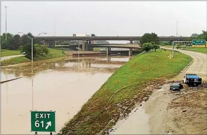  ?? ROYAL OAK TRIBUNE FILE PHOTO ?? Royal Oak City Manager Paul Brake says he hopes some of the COVID stimulus funding the city is getting can be used for improving storm water management. Storm water runoff overwhelme­d the drain system during a historic rainstorm in August 2014that flooded streets, freeways (above) and basements around the city, causing millions of dollars in damage.