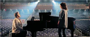  ?? [PHOTO PROVIDED BY LIONSGATE AND ROADSIDE ATTRACTION­S] ?? Bart Millard (John Michael Finley) and Amy Grant (Nicole DuPort) rehearse in the new film “I Can Only Imagine.”