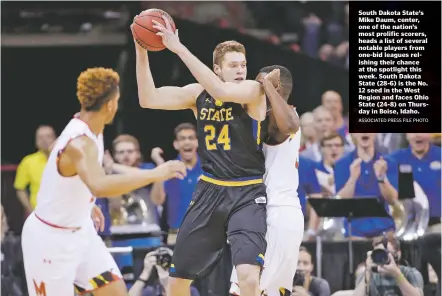  ?? ASSOCIATED PRESS FILE PHOTO ?? South Dakota State’s Mike Daum, center, one of the nation’s most prolific scorers, heads a list of several notable players from one-bid leagues relishing their chance at the spotlight this week. South Dakota State (28-6) is the No. 12 seed in the West...