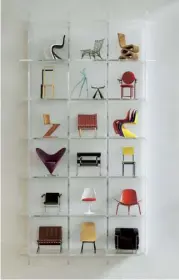  ??  ?? From left to right
A Perspex frame, housing a collection of Vitra furniture miniatures, is one of the pieces designed by Morgan herself. The studio at the top of the house is Morgan’s favourite room: ‘There are great views over London,’ she says. The...