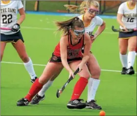  ?? GENE WALSH — DIGITAL FIRST MEDIA ?? Germantown Academy’s Catherine McFadden looks to pass during against Academy of Notre Dame during the PAISAA championsh­ip at The Proving Grounds Wednesday.