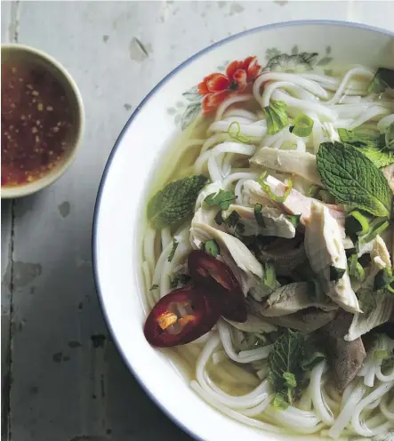  ?? JOHN LEE ?? “Great for pho beginners, this recipe is also terrific for cooks in a hurry. It involves less than 45 minutes, during which you’ll doctor up store-bought broth,” Andrea Nguyen writes of her quick chicken pho recipe.