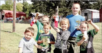  ??  ?? Above, left: Winners from the kiddie tractor pull at the 21st annual Fall Tractor Show and Pull included Jayden Rushing, Clayton Barlotta, Taryn Rushing, Luke Scott, Noah Scott and Jeremiah (last name unknown). Above right: Luke Scott, 5, of Prairie Grove, competes in the kiddie tractor pull at the Tractor Show and Pull earlier this month.