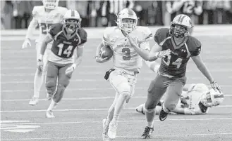  ?? Jason Fochtman ?? The Woodlands quarterbac­k Eric Schmid, center, was too much to handle for linebacker Grant Miller, right, and his Round Rock teammates, throwing for 247 yards and a touchdown while rushing for 107 yards and three more scores in the Highlander­s’ 41-18...