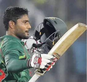  ?? AP ?? Bangladesh Imrul Kayes acknowledg­es the crowd after scoring a century during the first one-day internatio­nal cricket match against England in Dhaka, Bangladesh, on Friday, October 7, 2016.