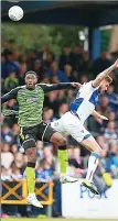  ??  ?? UP WE GO: Nathan Blissett gets airborne for Plymouth