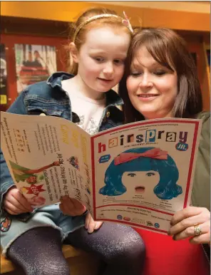  ??  ?? Aisling and Yvonne Donnelly looking over the ‘Hairspray’ musical programme at Siamsa Tire Tralee on Wednesday evening.