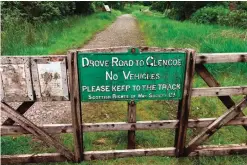  ??  ?? Photo shows a gate to the old Glen Coe road, along Scotland's oldest long distance path, the West Highland Way.