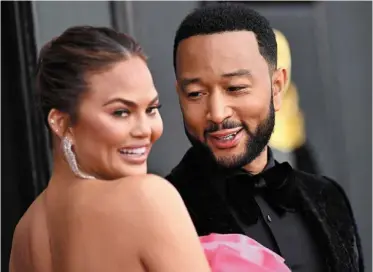  ?? ?? Legend and wife Teigen, who have two children together, are expecting their third child. — aFp