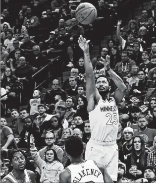  ?? JIM MONE/AP ?? Timberwolv­es guard Derrick Rose shoots over Antonio Blakeney. Rose scored 22 points off the bench.