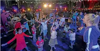  ?? Photos by Dhes Handumon ?? Five hours of non-stop entertainm­ent, including dance and music performanc­es and Kung Fu lessons, brighten up the Downtown Dubai, setting the mood for the Expo 2020 Dubai countdown. —