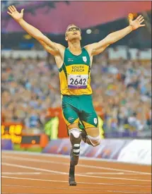  ??  ?? GOLD WINNER: Oscar Pistorius celebrates winning the men’s 400m T44 gold medal in the London 2012 Paralympic Games. He stirred controvers­y when beaten into second place in the 200m final, casting doubt on the legality of winner Alan Oliveira’s running...