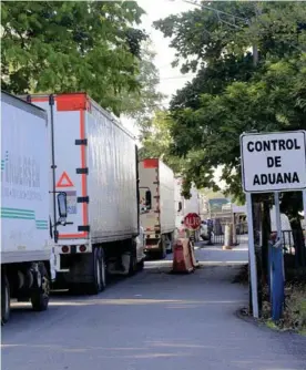  ?? RAFAEL PACHECO ?? El paso de mercancías en la aduana de Peñas Blancas, frontera en tre Costa Rica y Nicaragua, se ha visto afectado.