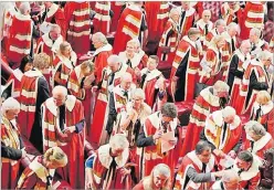  ?? Picture: AP ?? Guests in the House of Lords attend the official State Opening of Parliament in London.