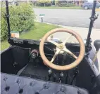  ?? PHOTOS: CATHERINE PATTISON ?? Motoring history . . . Wanaka couple Murray and Jenny Pryde will have their 1915 Ford T Roadster on display at the annual Autospecta­cular in the Edgar Centre today. The 1915 Ford T Roadster’s interior is sparse compared to modern cars and features a...
