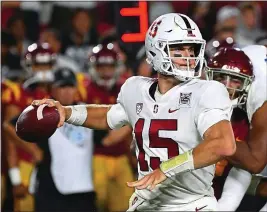  ?? JAYNE KAMIN-ONCEA — GETTY IMAGES ?? Stanford quarterbac­k Davis Mills sets to pass against USC at the Los Angeles Memorial Coliseum on Sept. 7. Mills will be Stanford’s starting quarterbac­k when the Cardinal plays Cal on Saturday.