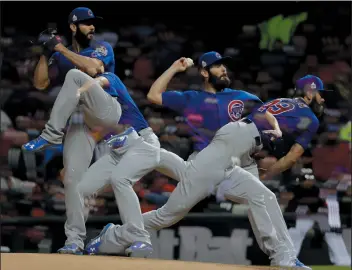  ?? AP PHOTO/MATT SLOCUM ?? In this multiple exposure picture, Chicago Cubs starting pitcher Jake Arrieta throws against the Cleveland Indians during the fifth inning of Game 2 of the Major League Baseball World Series Wednesday in Cleveland.
