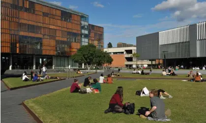  ?? Photograph: Paul Miller/AAP ?? Students at the University of Sydney. Young people will receive a 6.1% boost to youth allowance and Austudy in the new year as part of indexation.