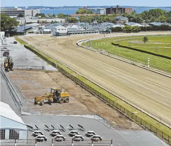  ?? STAFF FILE PHOTO, LEFT, BY ANGELA ROWLINGS; STAFF FILE PHOTO, ABOVE, BY MATT WEST ?? POSSIBLE HEADQUARTE­RS: Gov. Charlie Baker predicts communitie­s across the state will vie for Amazon's HQ2. One possible contender is Suffolk Downs, above.