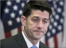  ?? J. SCOTT APPLEWHITE — THE ASSOCIATED PRESS ?? Speaker of the House Paul Ryan, R-Wis., meets with reporters following a closed-door Republican strategy session on Capitol Hill in Washington, Tuesday. Ryan says he’s hoping bargainers can resolve the final disputes in a government-wide spending bill...