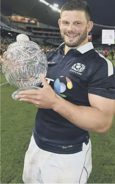  ??  ?? 0 Edinburgh and Scotland hooker Ross Ford with the Hopetoun Cup after the 24-19 victory over Australia in Sydney in which he equalled Chris Paterson’s record tally of 109 caps.