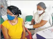  ?? SANTOSH KUMAR/HT ?? A woman takes Covid-19 jab in Patna Thursday.