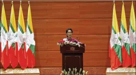  ?? AUNG SHINE OO / AP ?? Myanmar’s State Counsellor Aung San Suu Kyi speaks to the Myanmar Internatio­nal Convention Centre in Naypyitaw, Myanmar, Tuesday. Suu Kyi is defending her country against internatio­nal criticism over a mass exodus of Rohingya Muslims by saying it’s...