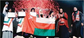  ??  ?? Students from Oman celebrate their victory.