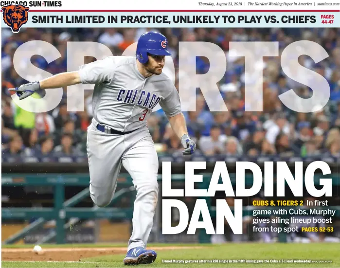  ?? PAUL SANCYA/AP ?? Daniel Murphy gestures after his RBI single in the fifth inning gave the Cubs a 3-1 lead Wednesday.