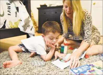  ?? Tyler Sizemore / Hearst Connecticu­t Media ?? Andy Katz, 5, practices reading aloud with SpeechLang­uage Pathologis­t Sally Connolly at his home in Stamford on Aug. 13.