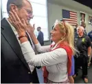  ?? USA TODAY NETWORK ?? U.S. Rep. Debbie Dingell, D-Mich., embraces United Auto Workers President Gary Jones at a town hall meeting in July in Detroit, where they discussed the future of pensions.