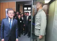  ?? YONHAP NEWS AGENCY ?? Republic of Korea’s President Moon Jae-in visits the history exhibit at the Museum of the Provisiona­l Government of the Republic of Korea in Chongqing on Saturday.