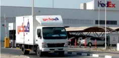  ?? AFP ?? FedEx’s regional hub at Dubai Internatio­nal Airport. FedEx will begin to show higher margins as costs fall. —