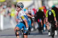  ?? STEPHANE MAHE/POOL PHOTO AP ?? France’s Julian Alaphilipp­e, celebrates as he crosses the finish line to win the second stage of the Tour de France over 115,6 miles on Sunday in Nice.