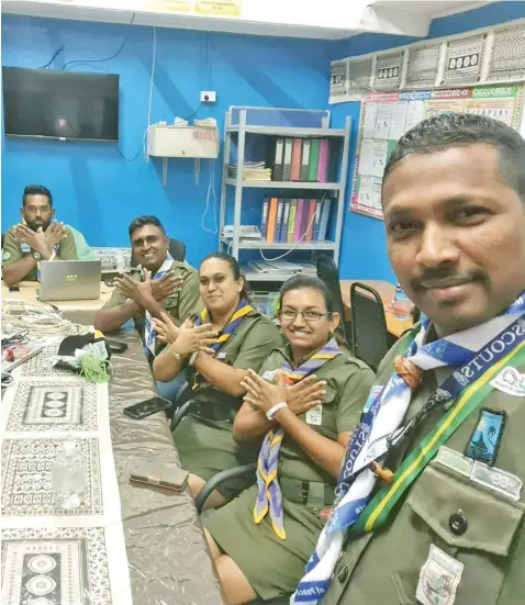  ?? Photo: Fiji Scouts Associatio­n ?? The National Scouts Organisati­on Coordinato­r for Messengers of Peace, Kailash Pillay (right), with the members of the Fiji Scouts Associatio­n and Messengers of Peace core team connecting to the virtual conference from the Lautoka School for Special Education on September 21, 2021.