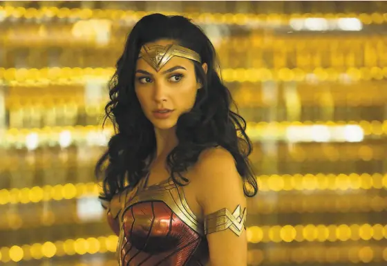  ?? Clay Enos / Warner Bros ?? Gal Gadot returns as the amazing amazon in “Wonder Woman 1984.” It arrives Christmas Day in theaters and on HBO Max.