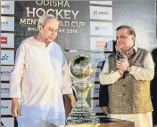  ??  ?? ■ Chief minister of Odisha Naveen Patnaik (left) unveils the Hockey World Cup trophy with FIH president Narinder Batra. HOCKEY INDIA