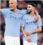  ??  ?? Riyad Mahrez, right, with skipper Vincent Kompany