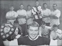  ?? Photograph: Anthony MacMillan. ?? 1998: Colin McLean of Claggan Dambusters pictured with the trophy his team were presented with after winning the winter five-a-side football league in Marco’s. The league, organised by Alan Boyd, again proved to be a great success, with 12 teams competing over 22 weeks. A special mention is made of referees A Grant and B Davies for their work during the tournament.