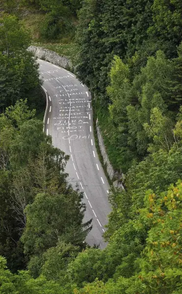  ??  ?? Far right: Signs count down each of the Alpe’s famous hairpin bends, and list previous stage winners