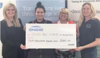  ??  ?? Cheque it out Lorna Preston from Engie (left) hands over the cheques to Lauren Fearon from KLAS Care, Jean Gallagher from JCLC and Jennifer O’Brien from LEAP