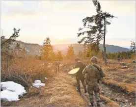  ?? Staff Sgt. Samuel Garcia, 1-108th Cavalry ?? 1-108th Cavalry troopers conduct a patrol in the mountains of Kosovo.