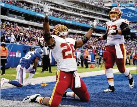  ?? GETTY IMAGES ?? Adrian Peterson reacts after rushing for a 64-yard touchdown against the Giants this past Sunday. Peterson has the Falcons’ full attention this week.