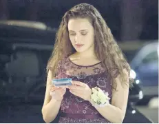  ?? BETH DUBBER/NETFLIX ?? Katherine Langford as Hannah Baker in a scene from the series, 13 Reasons Why. The popular TV series about Baker’s suicide that showed her ending her life may have prompted a surge in online searches for suicide, including how to do it, according to a...