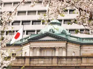  ??  ?? The BoJ is widely expected to keep policy unchanged at a meeting this week as it waits for more data to show a pick-up in inflation. (Reuters)