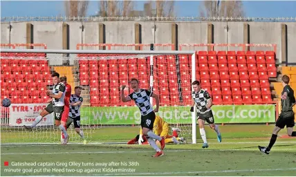  ?? ?? ■ Gateshead captain Greg Olley turns away after his 38th minute goal put the Heed two-up against Kiddermins­ter